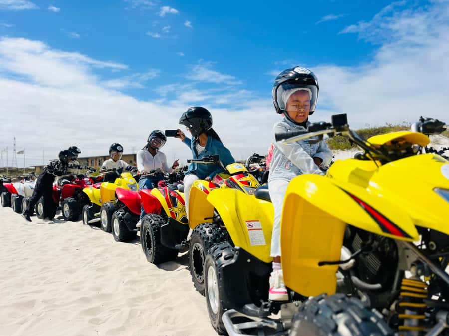 ATV Atlantis dunes: PHOTOSHOOT & VIDEOS - White sand, open sky, and a mountain backdrop