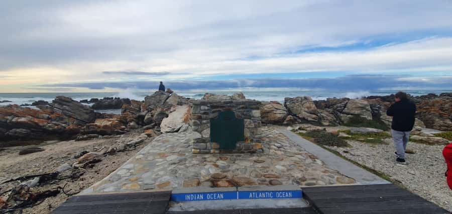 Cape Town: Cape Aghullas Van Tour with Hotel Pickup - From Cape Town through Khayelitsha and the mountain roads