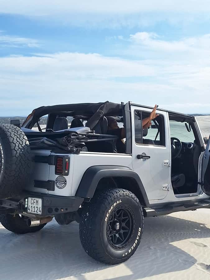 Cape Town Desert Thrills: Dune Jeep Venture - Base camp, drinks, and sandboarding