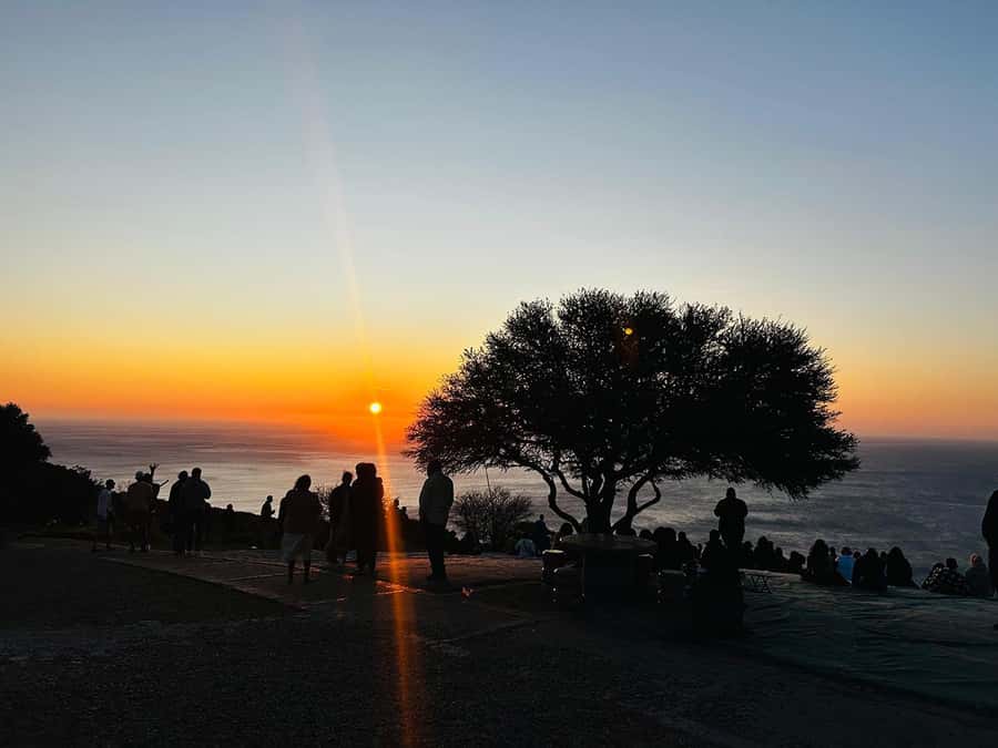 Cape Town: Sunset Bus Tour with Picnic on Signal Hill - Leaving the V&A Waterfront for the Atlantic Seaboard