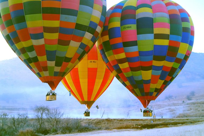 Early Morning Balloon Safari with Breakfast from Magaliesburg - The landing, drinks, and return to the clubhouse
