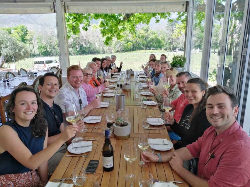 Franschhoek & Stellenbosch: Full-Day Wine Tour - Tasting wine with cheese, chocolate, and biltong