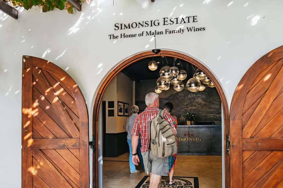 From Cape Town: 3 Regions Wine Tour with 3 Estates, 15 Wines - A short walk through historic Stellenbosch