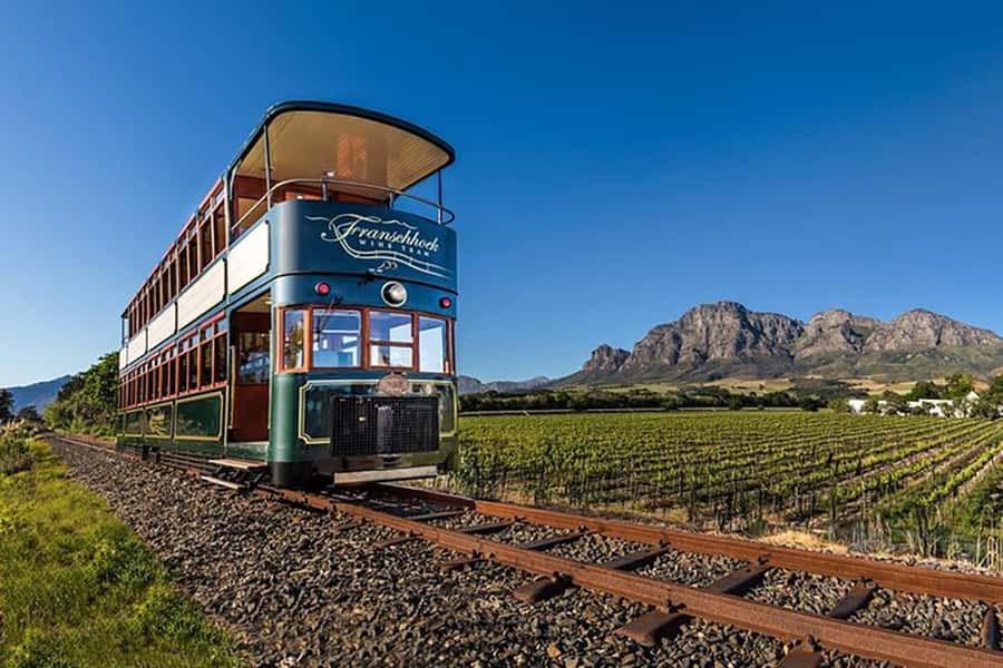 From Cape Town: Full-Day Cape Winelands Taste Tour + Tram - Franschhoek brings the most distinctive transport