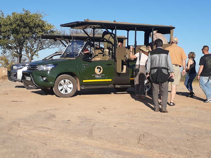 From Malelane: Kruger National Park Full-Day Safari - Entering Kruger in an open-sided 4x4