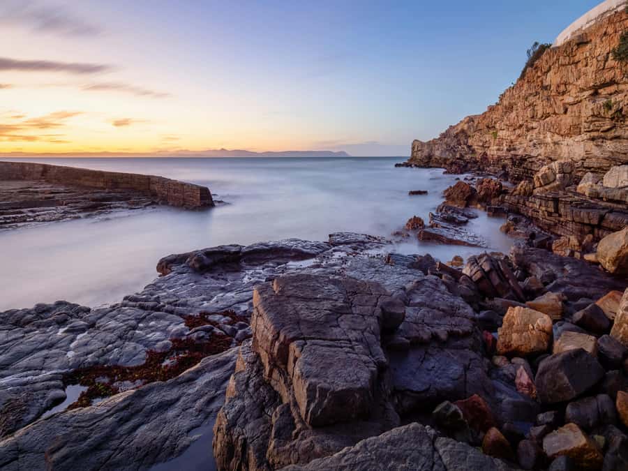 Full day Cape Penisula Tour: Chapman's Peak - Cape Point - Muizenberg and Kalk Bay add two different coastal moods