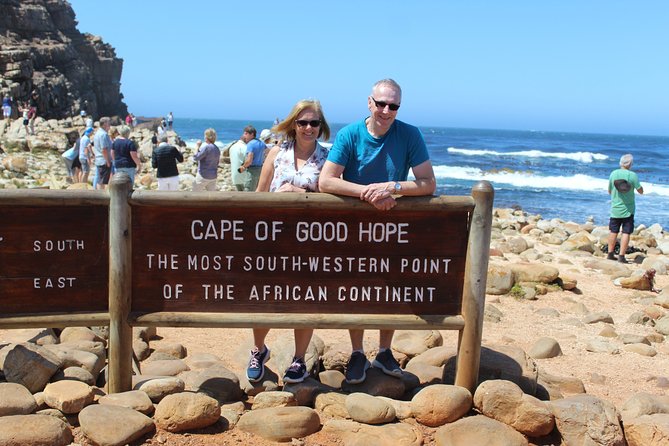 Full-Day Tour to Cape Point and Cape of Good Hope - Camps Bay and Hout Bay: polished beach to working harbor