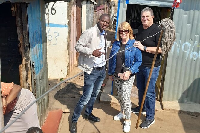 Half Day Soweto and Apartheid Museum Guided Tour - Walking through Motsoaledi informal settlement