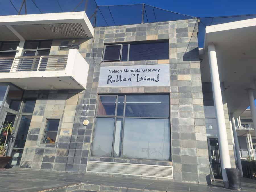Half Day Tour to Robben Island with Pre-Booked Ticket - Walking through the V&A Waterfront
