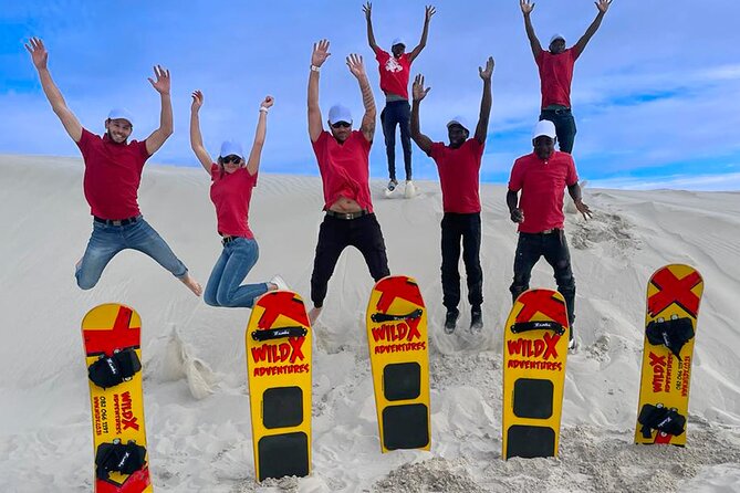 JEEP 4x4, Quadbike, and Glam Sandboarding Combo at Atlantis Dunes - Sandboarding down the steep slopes