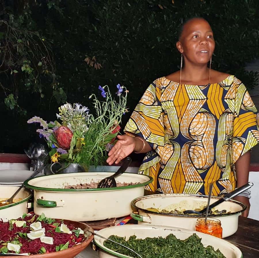 Johannesburg: Pan-African Cooking & Dinning Experience - Eating the meal you helped prepare