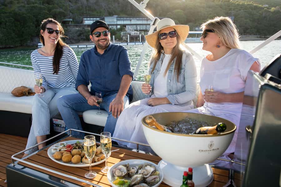Knysna: Private Sunset Cruise on Knysna Lagoon - Adding oysters, drinks, and your own music