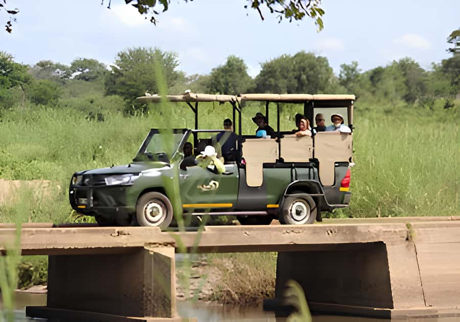 Kruger National Park Safari (Full Day) - Entering Kruger in an open safari vehicle