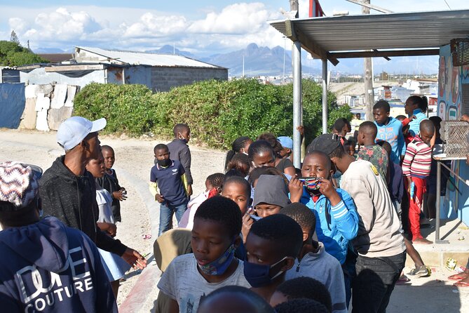 Pop-Up Cinema in the Community + Post Film Discussion with Locals - Meeting local adults, not watching from the sidelines