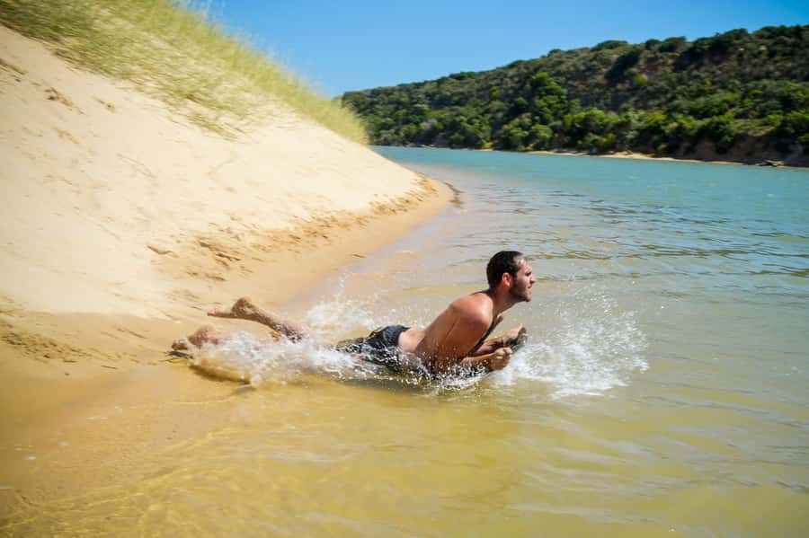 Port Elizabeth: Sandboarding with Short Boat Trip - A boat ride to South Africa’s biggest dune field