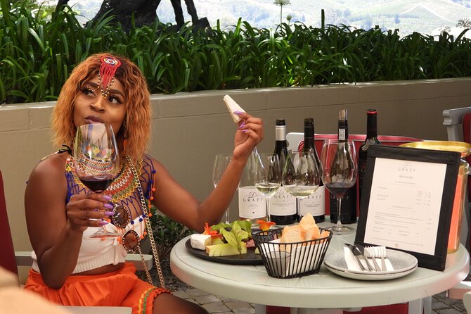 Stellenbosch & Franschhoek 20 Wine Tasting + Lunch Shared Tour - Delheim: wine, lunch, and family character