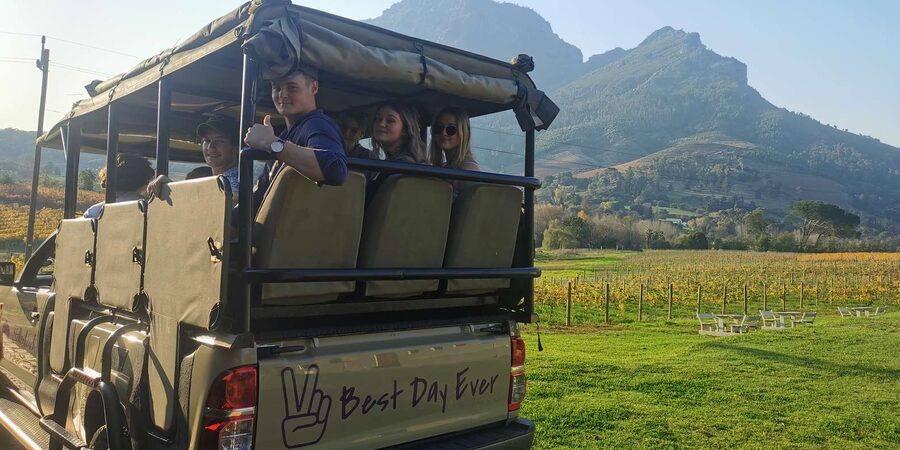 Stellenbosch North Guided Wine Safari (Tastings Excluded) - Riding the open safari vehicle