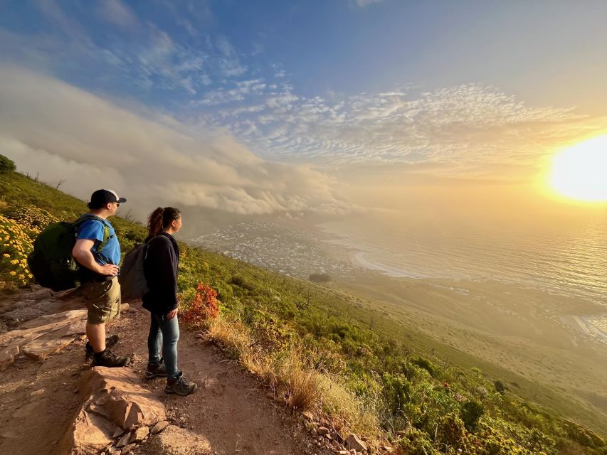 Sunrise & Sunset Lion's Head Hike + Hotel Pick-Up - Rocky paths, grass, and the first uphill stretch