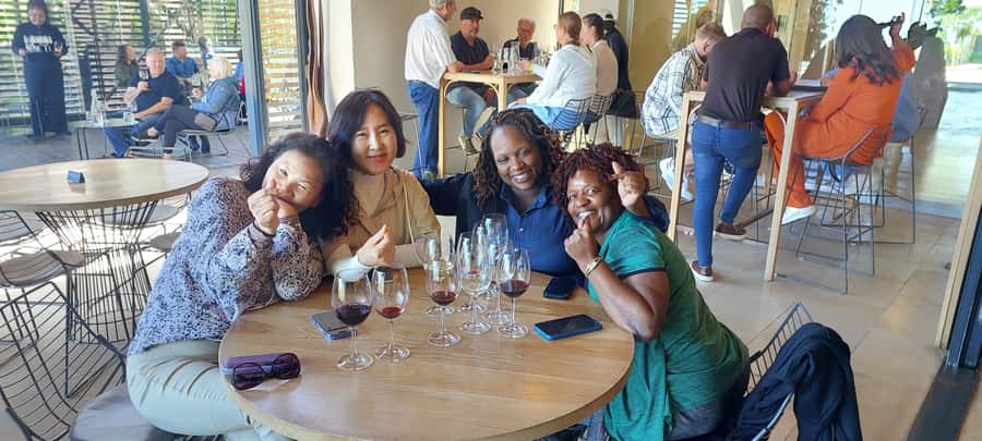 Table Mountain and Stellenbosch Wine tasting tour - Transport, group size, and the pace of the day