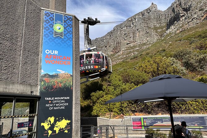 Table Mountain, Kirstenbosch and Constantia Winelands Full Day Private Tour - Riding the cableway up Table Mountain